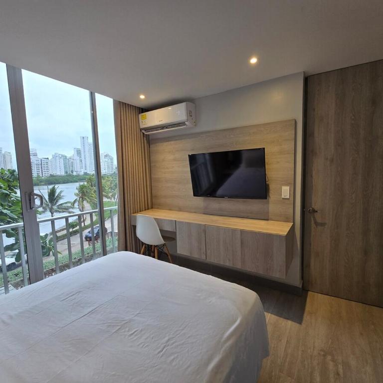 Apartamento con balcón y vista al lago - One-Bedroom Apartment - 9