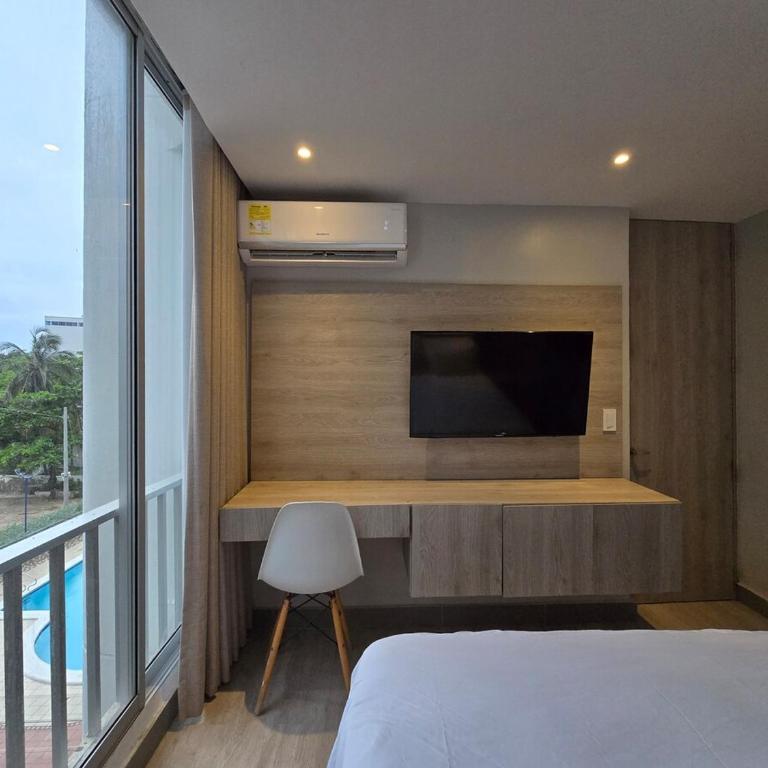 Apartamento con balcón y vista al lago - One-Bedroom Apartment - 10