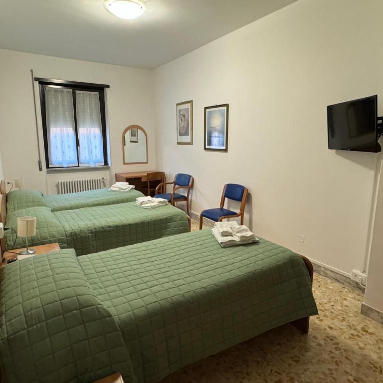 Casa Per Ferie Casa Cabrini - Chambre Triple - Vue sur Jardin - 1