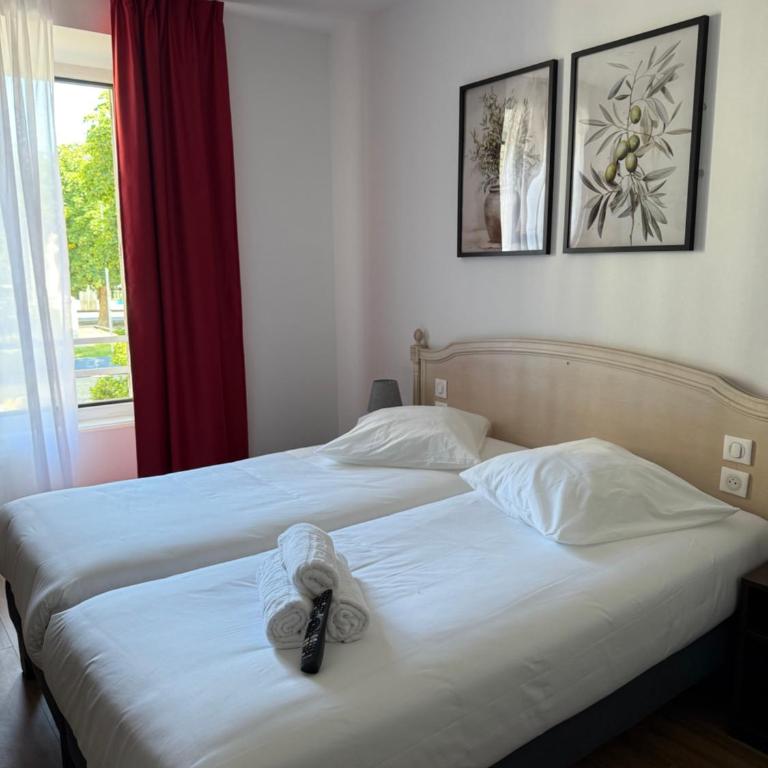 Hôtel de la paix - Chambre Lits Jumeaux - 7