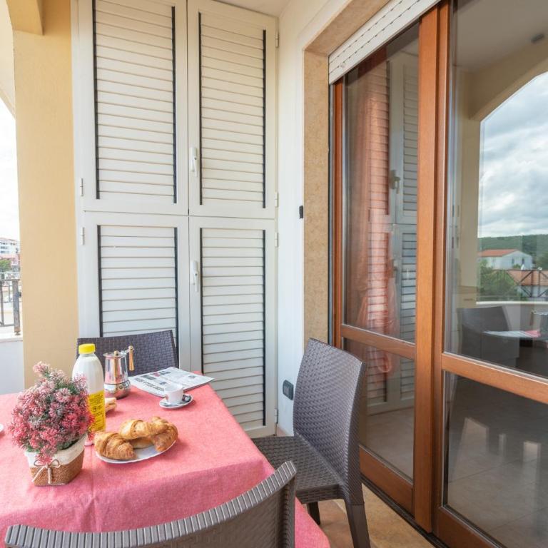 AffittaSardegna-Appartamenti Agostino - Appartamento Familiare con 2 Camere da Letto - 1