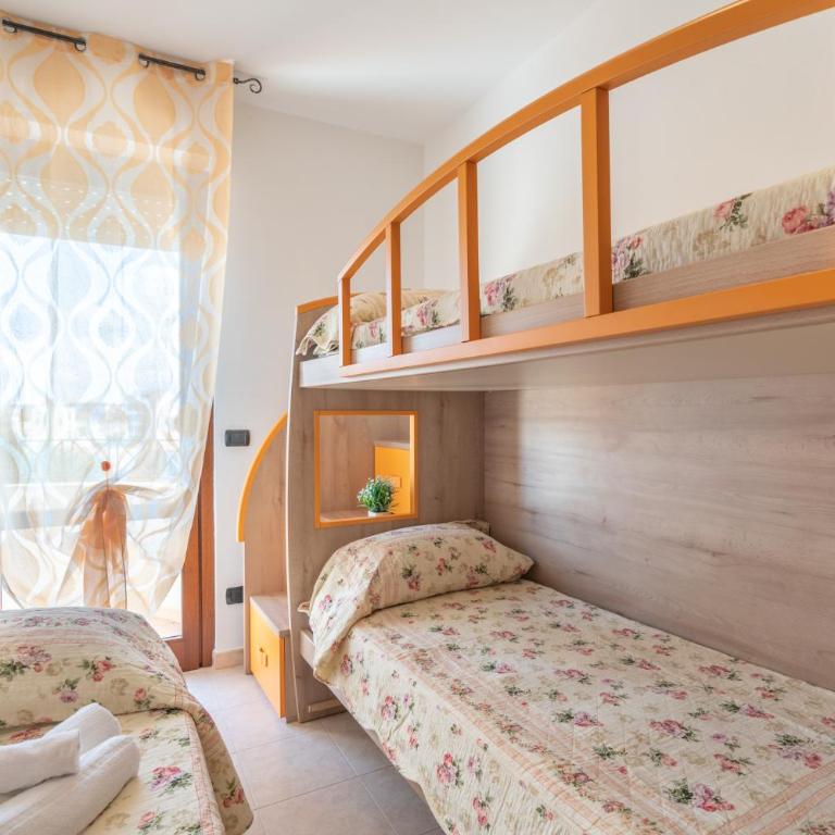 AffittaSardegna-Appartamenti Agostino - Appartamento Familiare con 2 Camere da Letto - 4