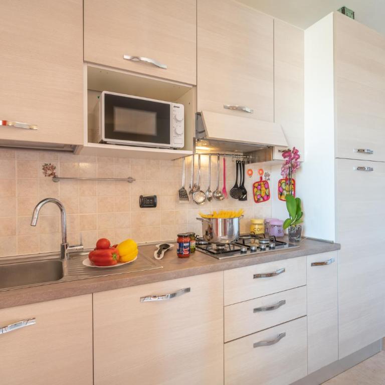 AffittaSardegna-Appartamenti Agostino - Appartamento Familiare con 2 Camere da Letto - 8