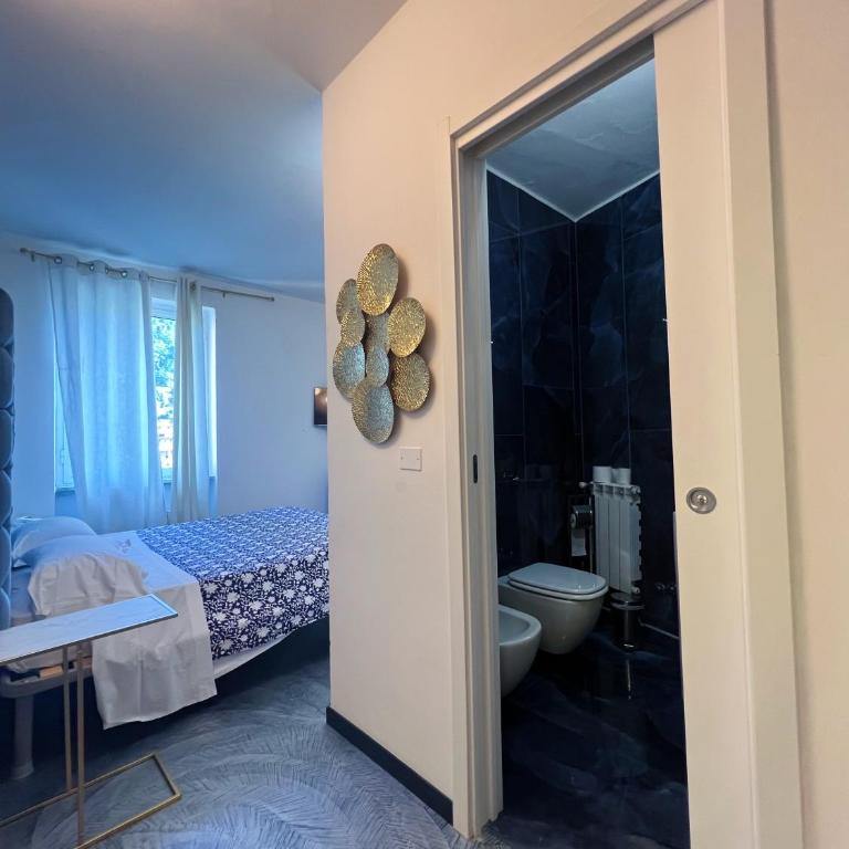 Hotel Le Grazie - Camera Superior Matrimoniale/Doppia con Letti Singoli con Vista Città - 10