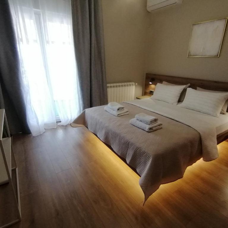 Apartments Knežević - Two-Bedroom Deluxe Apartment with Ocean View - 1