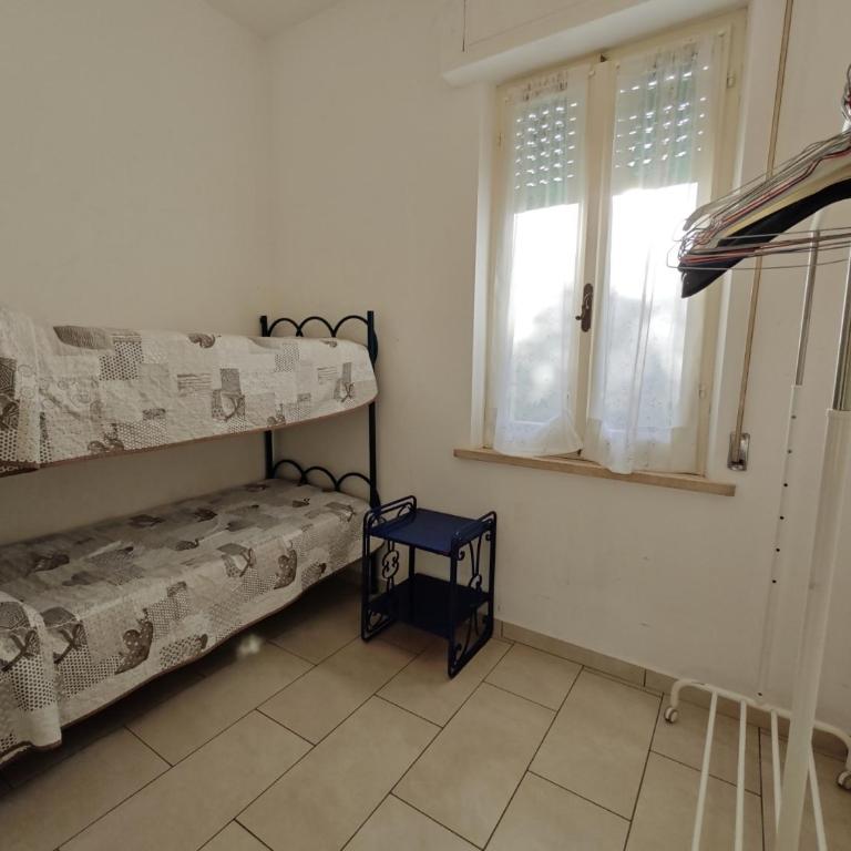 R04 - Comodo trilocale con giardino e posto auto - Appartamento - 11