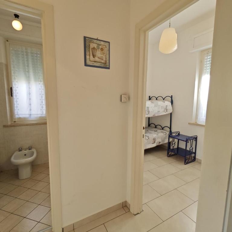 R04 - Comodo trilocale con giardino e posto auto - Appartamento - 22