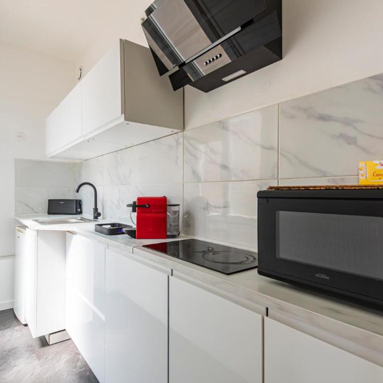 Immeuble spacieux - hyper centre - 15 couchages - Maison 7 Chambres - 14