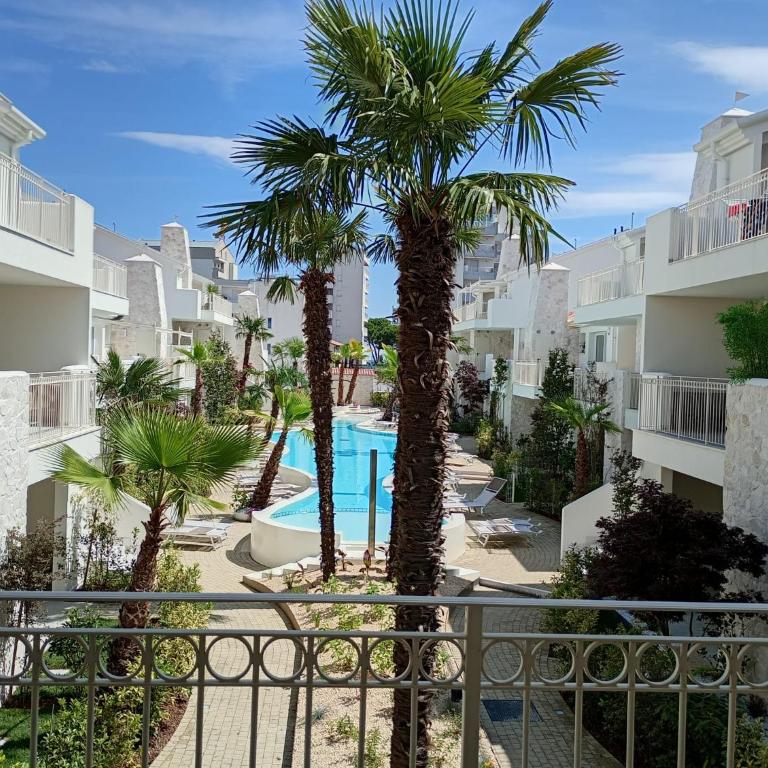 Residence Florinas con piscina - Family Apartments Lido di Jesolo - Appartamento con 2 Camere da Letto e Terrazza - 12