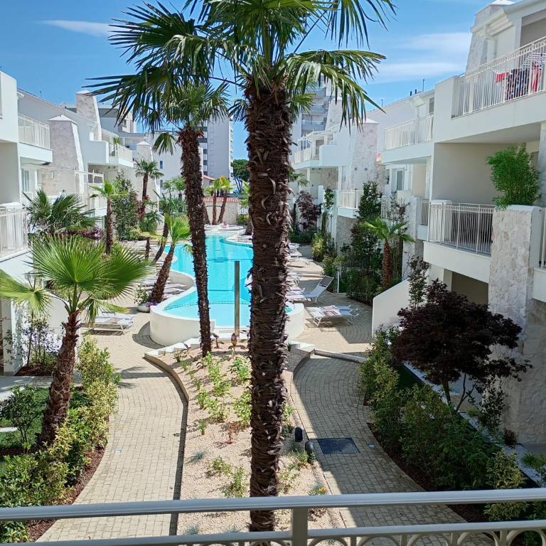 Residence Florinas con piscina - Family Apartments Lido di Jesolo - Appartamento con 2 Camere da Letto e Terrazza - 13