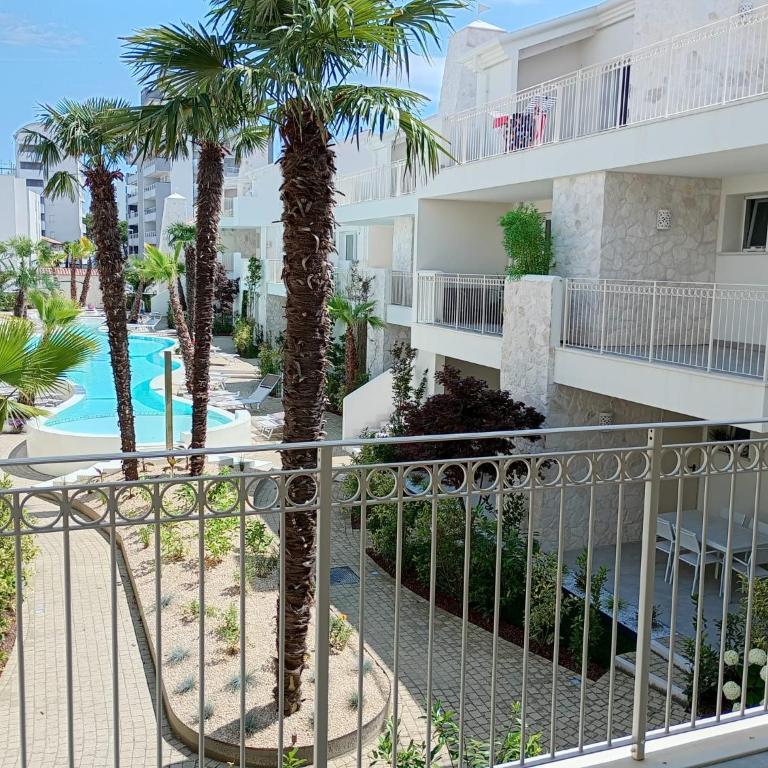Residence Florinas con piscina - Family Apartments Lido di Jesolo - Appartamento con 2 Camere da Letto e Terrazza - 14
