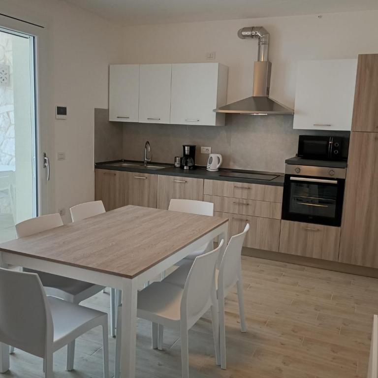 Residence Florinas con piscina - Family Apartments Lido di Jesolo - Appartamento con 2 Camere da Letto e Terrazza - 24