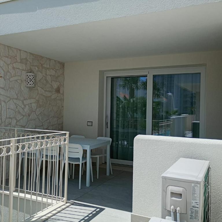 Residence Florinas con piscina - Family Apartments Lido di Jesolo - Appartamento con 2 Camere da Letto e Terrazza - 21