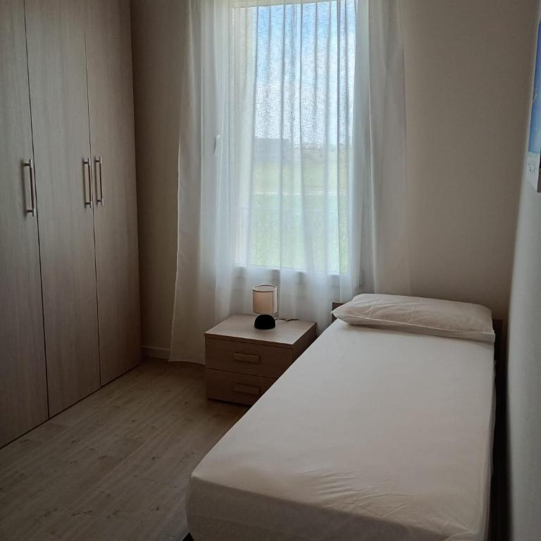 Residence Florinas con piscina - Family Apartments Lido di Jesolo - Appartamento con 2 Camere da Letto e Terrazza - 11