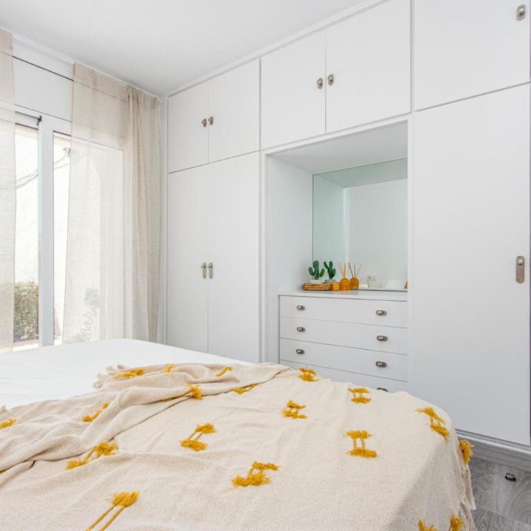 Milenial Immo GC - Garden apartment near the beach - Two-Bedroom Apartment with Garden View - 12