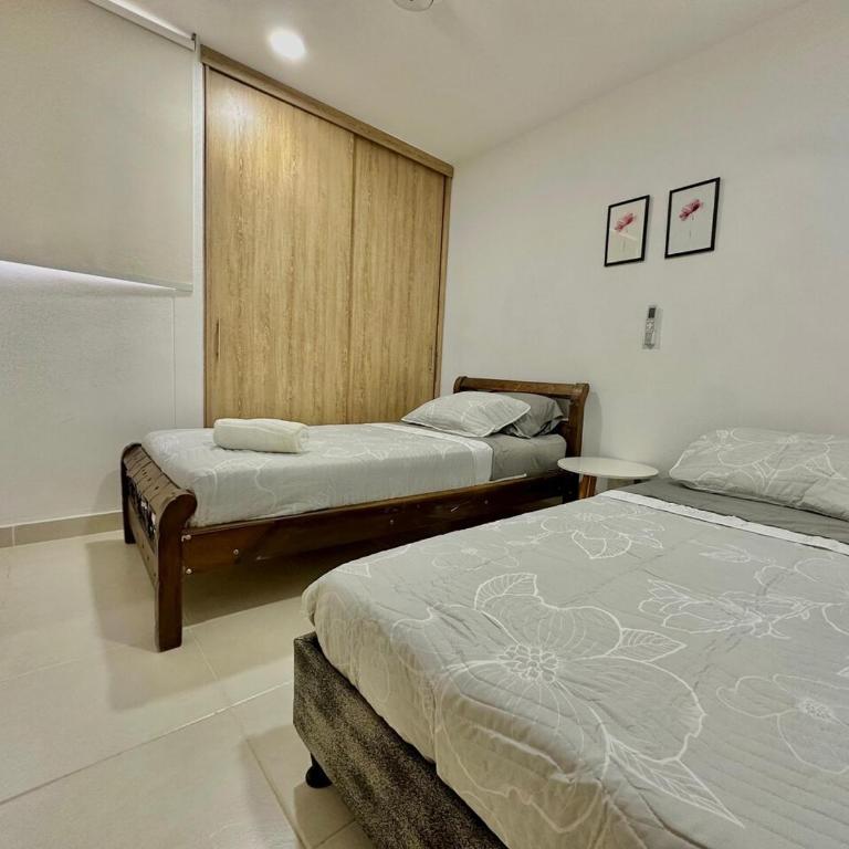 Apartment 5 minutes from Pozos Colorados beach 10 minutes from Rodadero Airport - Three-Bedroom Apartment - 24