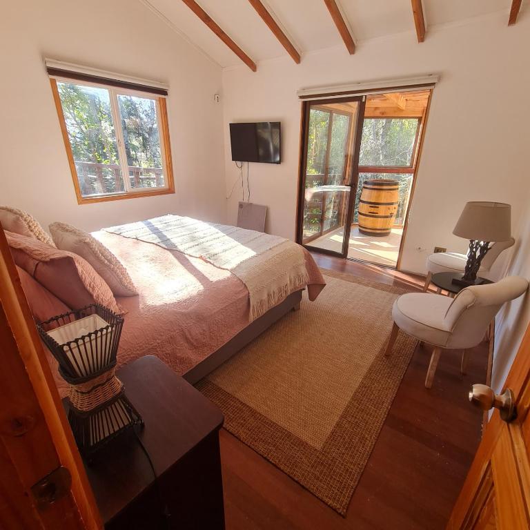 CASA CON TINAJA, PISCINA Y QUINCHO - Pucón - Three-Bedroom Vacation Home - 12