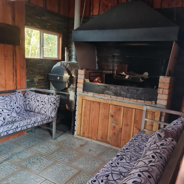 CASA CON TINAJA, PISCINA Y QUINCHO - Pucón - Three-Bedroom Vacation Home - 16