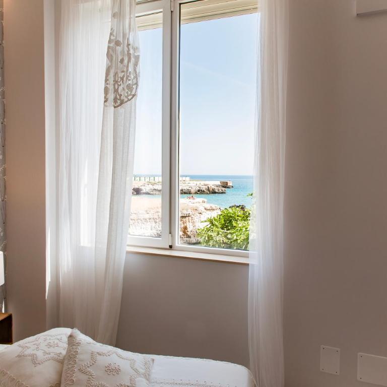 Acquamarina Suites by MONHOLIDAY - Camera Queen con Vista Mare - 15