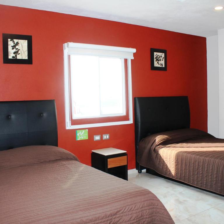 Hotel Leones - Habitación Doble - 2 camas dobles - 2
