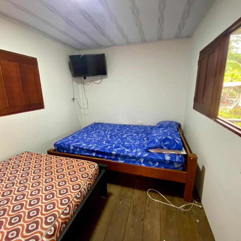 Las Perlas - Playa Huina - Habitación Doble con baño privado externo - 2 camas - 2