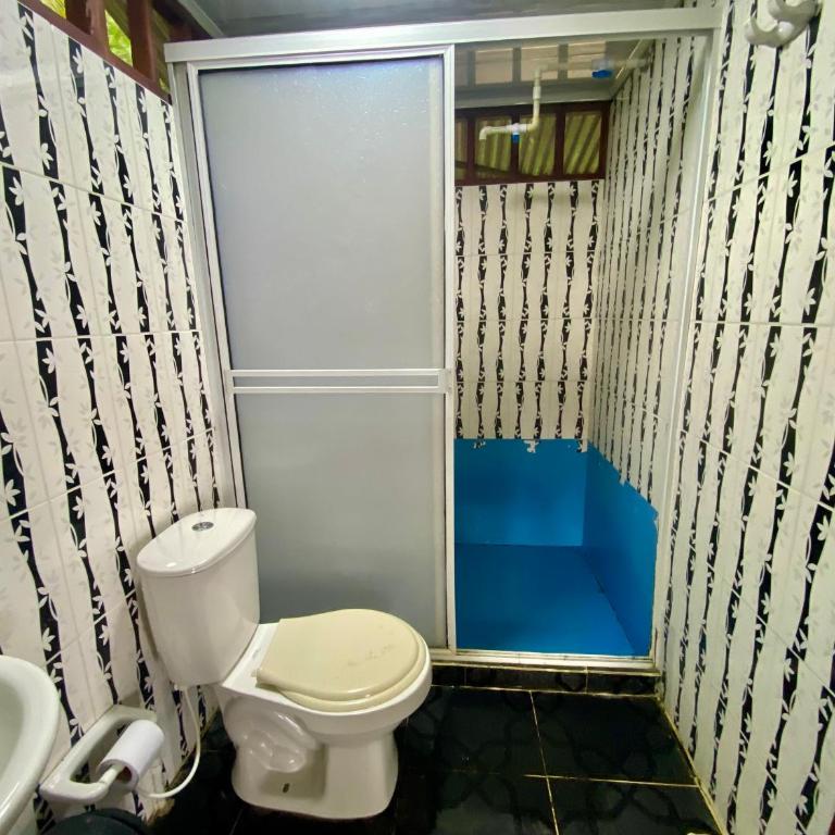 Las Perlas - Playa Huina - Habitación Doble con baño privado externo - 2 camas - 5