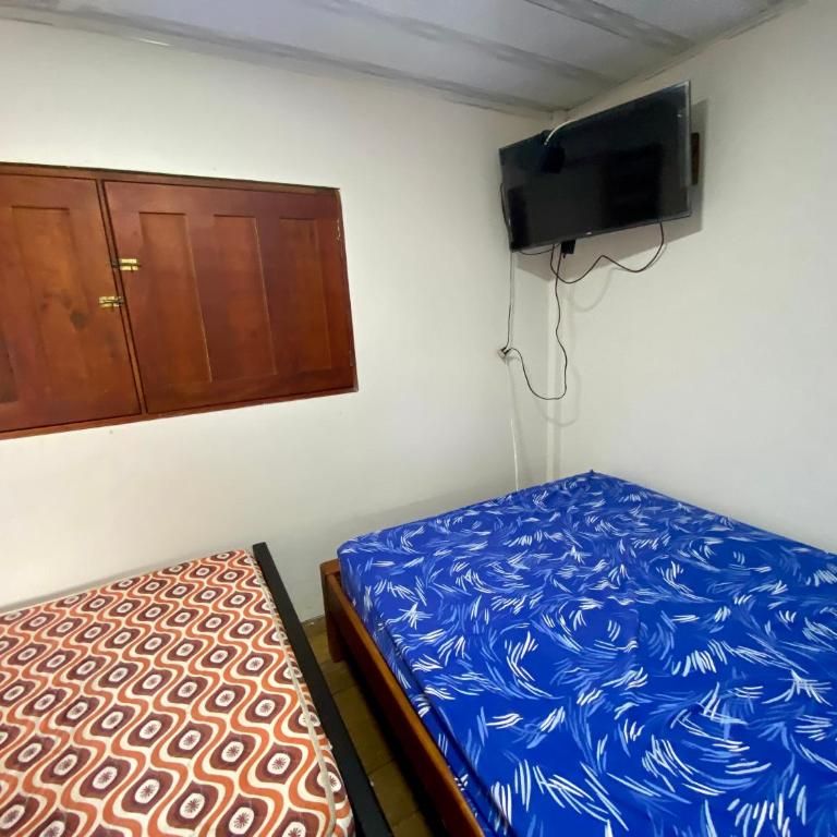 Las Perlas - Playa Huina - Habitación Doble con baño privado externo - 2 camas - 4