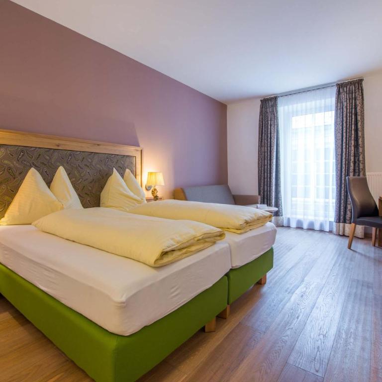 Posthotel Radstadt - Deluxe Vierbettzimmer - 1