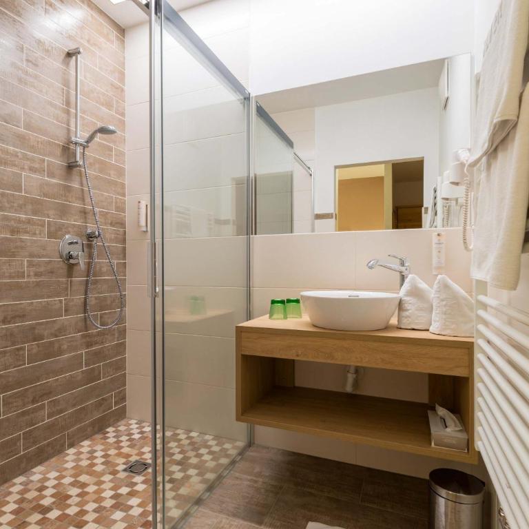 Posthotel Radstadt - Deluxe Vierbettzimmer - 3