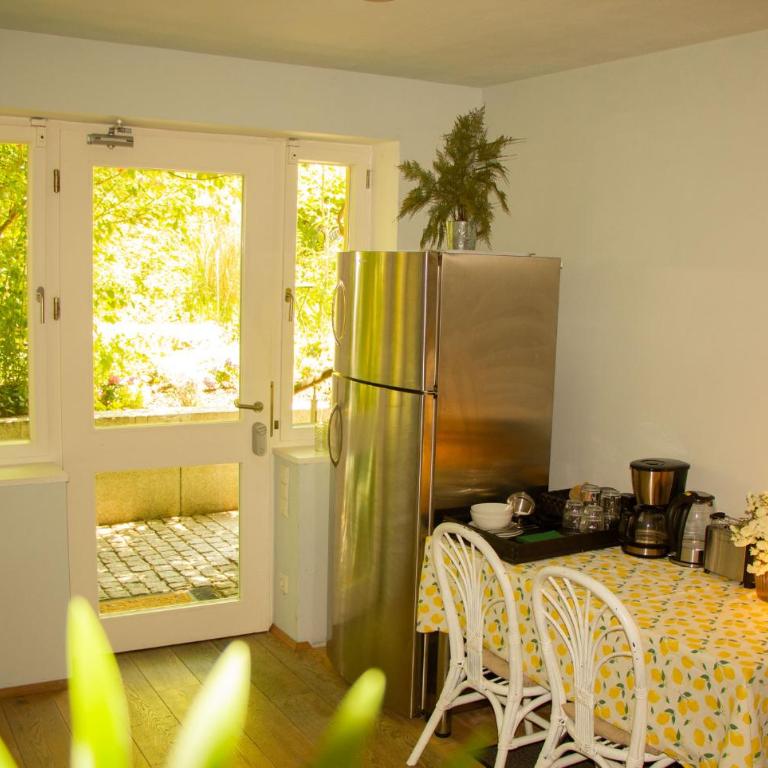 Vis-à-Vis Schloss Nymphenburg - Rondellapartments - Deluxe Doppelzimmer mit Blick auf das Schloss - 10