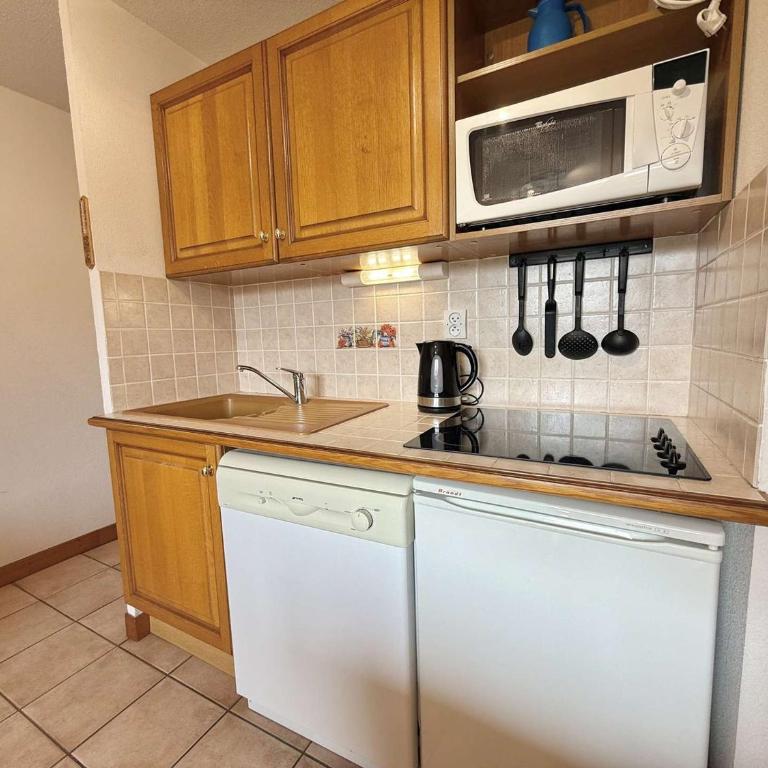 Spacieux 3 pièces à Praz-sur-Arly, balcon sud-ouest, garage, proche centre et remontées mécaniques - Appartement 2 Chambres - 10