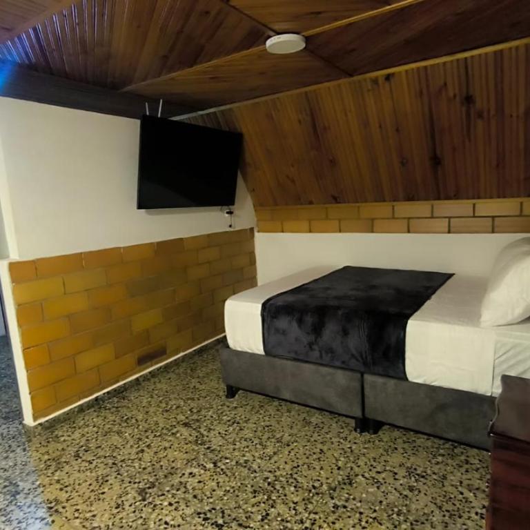 Alojamiento casa campestre Barbosa Santander - Four-Bedroom House - 4
