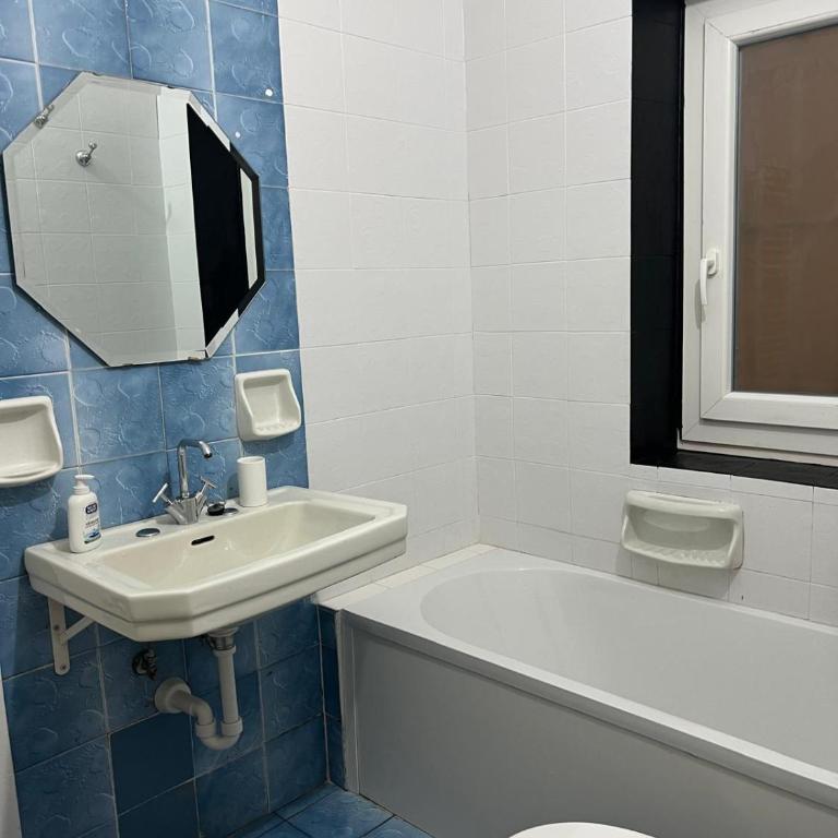 Yard - Two-Bedroom Apartment with Balcony - 9