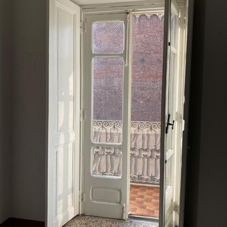 Yard - Two-Bedroom Apartment with Balcony - 12