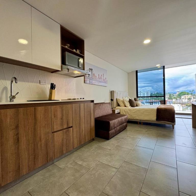 Apartaestudio con balcón en zona top - One-Bedroom Apartment - 1