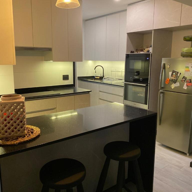 Acogedor departamento de lujo - Three-Bedroom Deluxe Apartment - 9