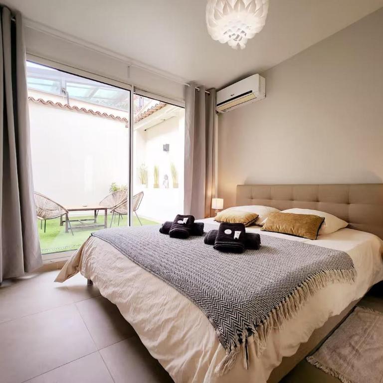 Le Thuret Fleuri - T3 avec Terrasse - Apartment mit 2 Schlafzimmern - 3