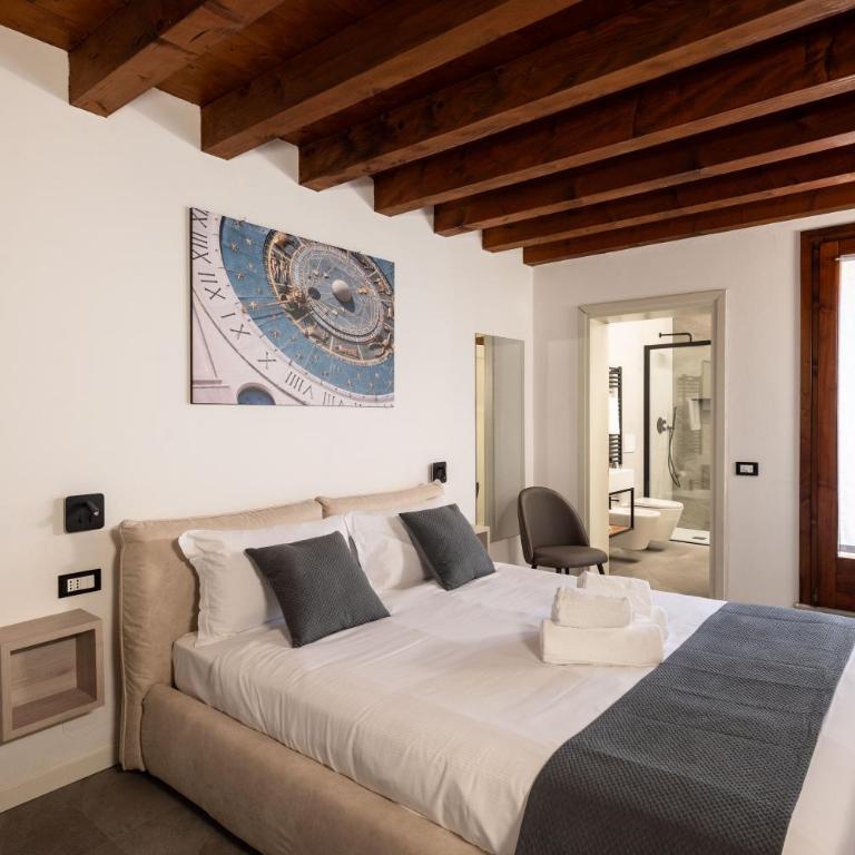 GuestHost - Santo 86 Luxury Rooms - Camera Matrimoniale con Patio - 1