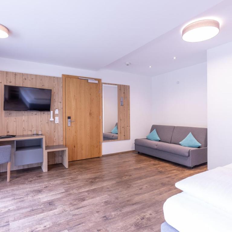 Haus Sattelblick - Familienzimmer mit Balkon - 7