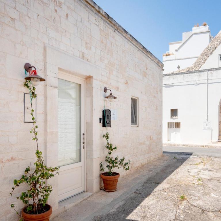 Trulli Lithos Suite - Appartamento Familiare con 1 Camera da Letto - 6