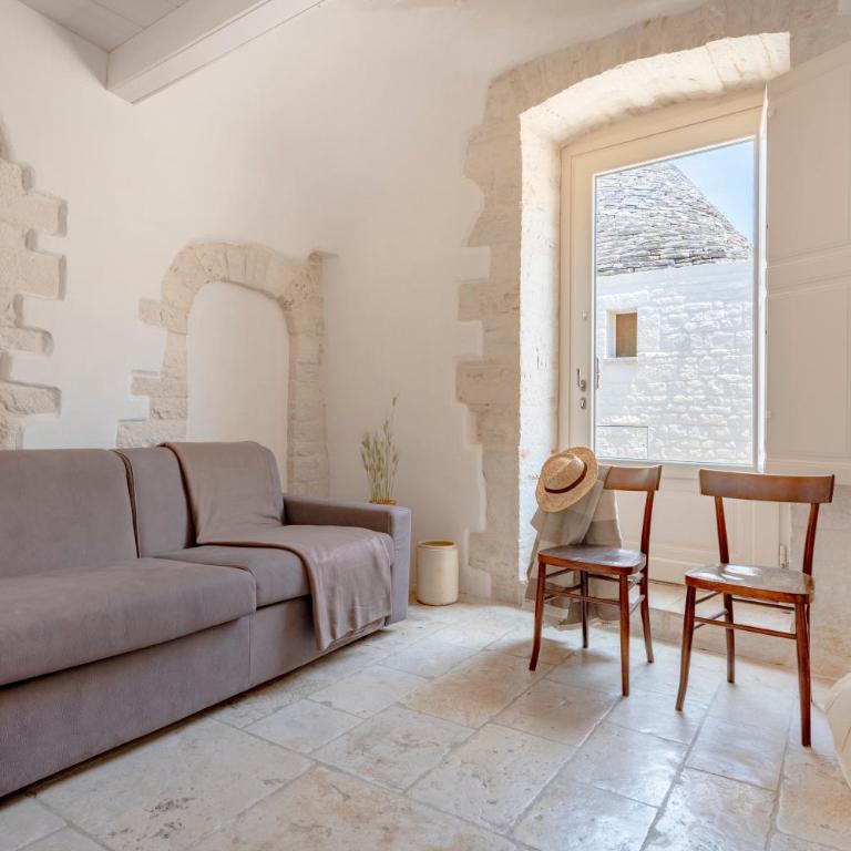 Trulli Lithos Suite - Appartamento Familiare con 1 Camera da Letto - 11