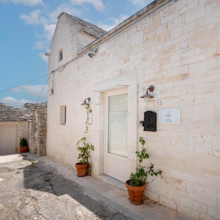 Trulli Lithos Suite - Appartamento Familiare con 1 Camera da Letto - 1
