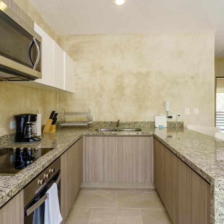 Charming Nature-Inspired Condos with Sultry Surroundings by Stella Rentals - 2BR Terrace & Pool - 9