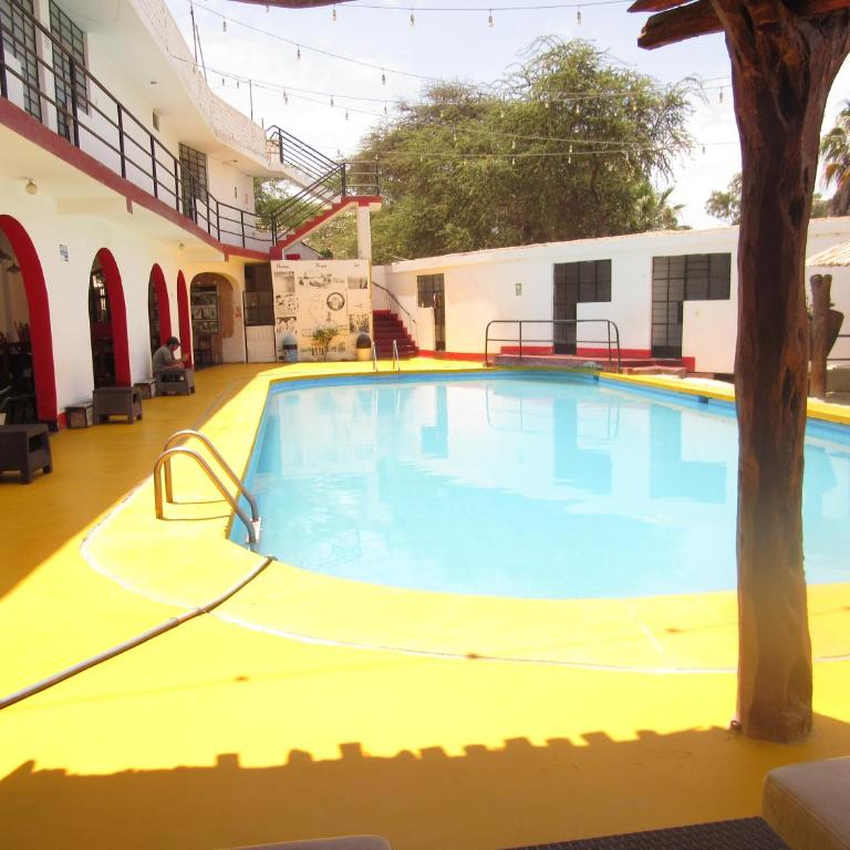 Hospedaje con vista ala laguna de huacachina refugio en el oasis - Quadruple Room - 8