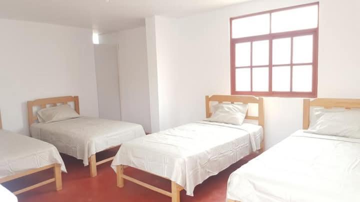 Hospedaje con vista ala laguna de huacachina refugio en el oasis - Quadruple Room - 4