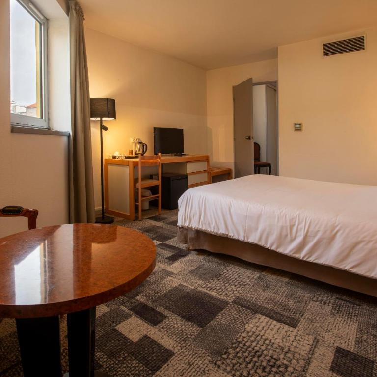 Hôtel Paradis - Chambre Double ou Lits Jumeaux - 8