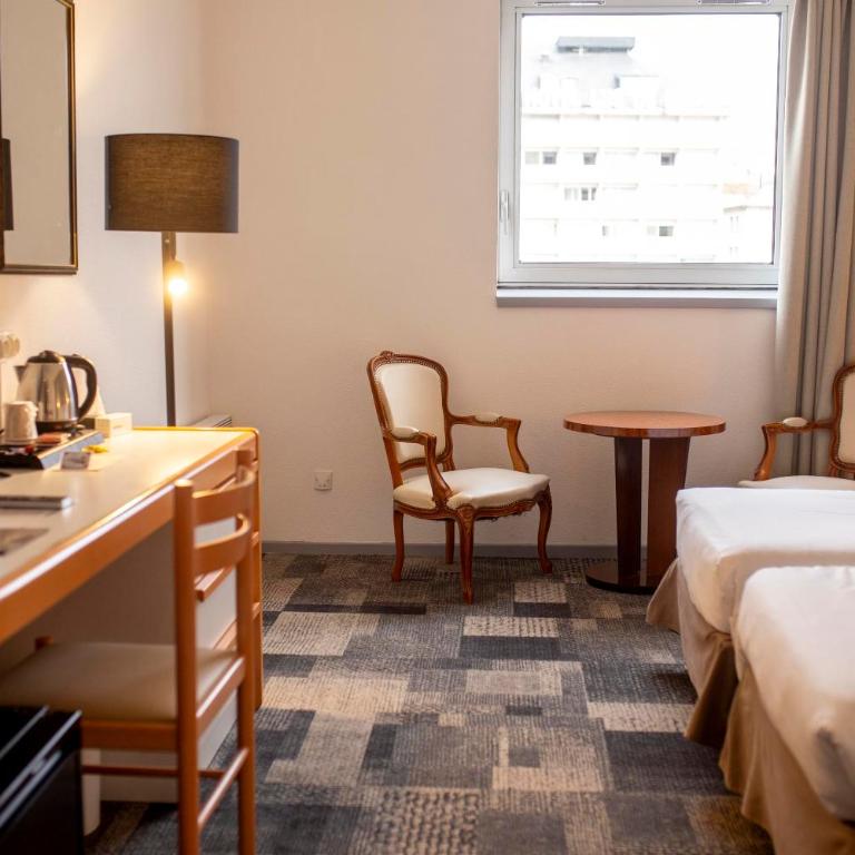 Hôtel Paradis - Chambre Double ou Lits Jumeaux - 14