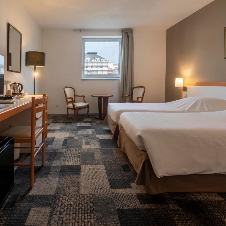Hôtel Paradis - Chambre Double ou Lits Jumeaux - 10