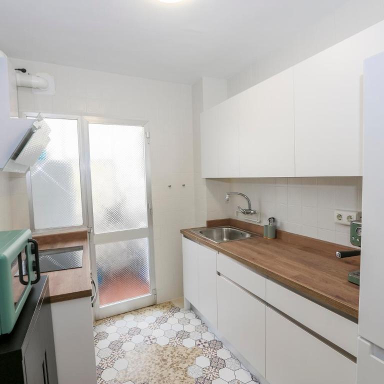 Real 1 - Three-Bedroom Apartment - 31