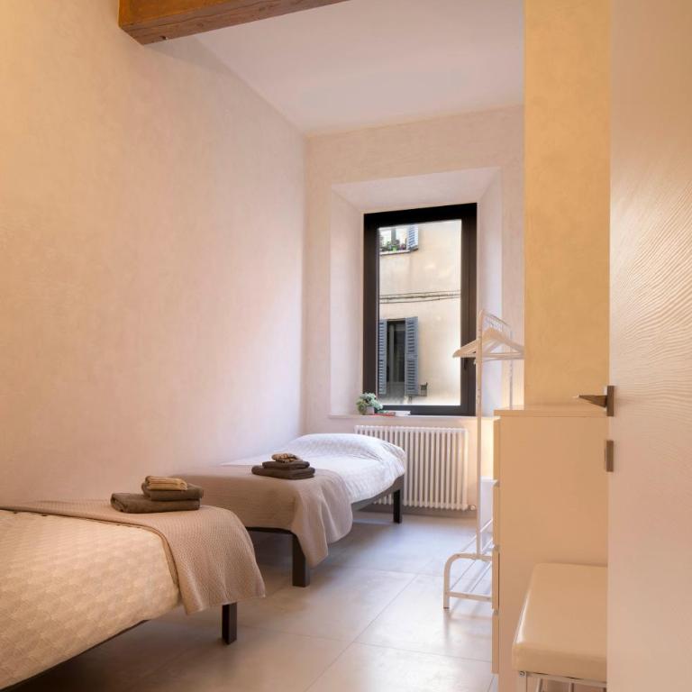Via Verdi SUITE - Camera Quadrupla Comfort - 8